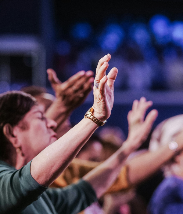 Hands clasped in prayer, symbolizing faith and hope